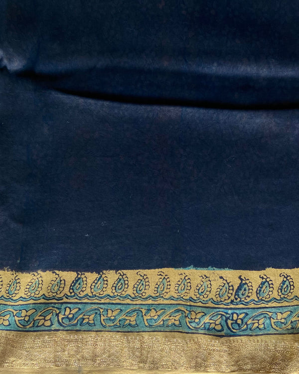 'CHAITANYA: Ochre' Ajrakh Maheshwari Handloom Saree