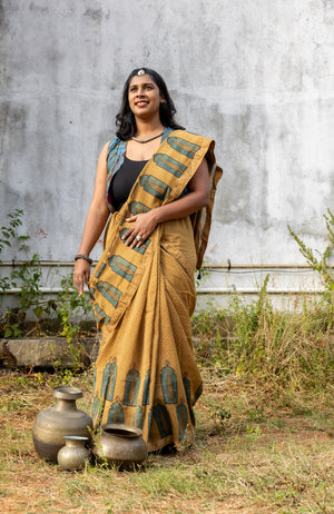 'CHAITANYA: Ochre' Ajrakh Maheshwari Handloom Saree