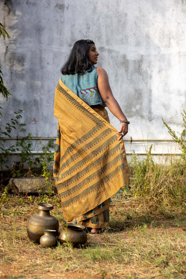 'CHAITANYA: Ochre' Ajrakh Maheshwari Handloom Saree